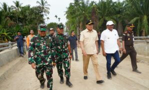 018514400_1765670212-Menko_Polkam_Djamari