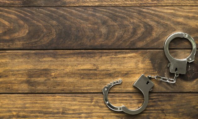 025196900_1603441356-top-view-frame-with-handcuffs-copy-space