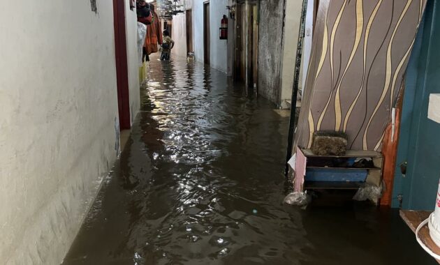 094278600_1772952247-Banjir_Benhil (1)